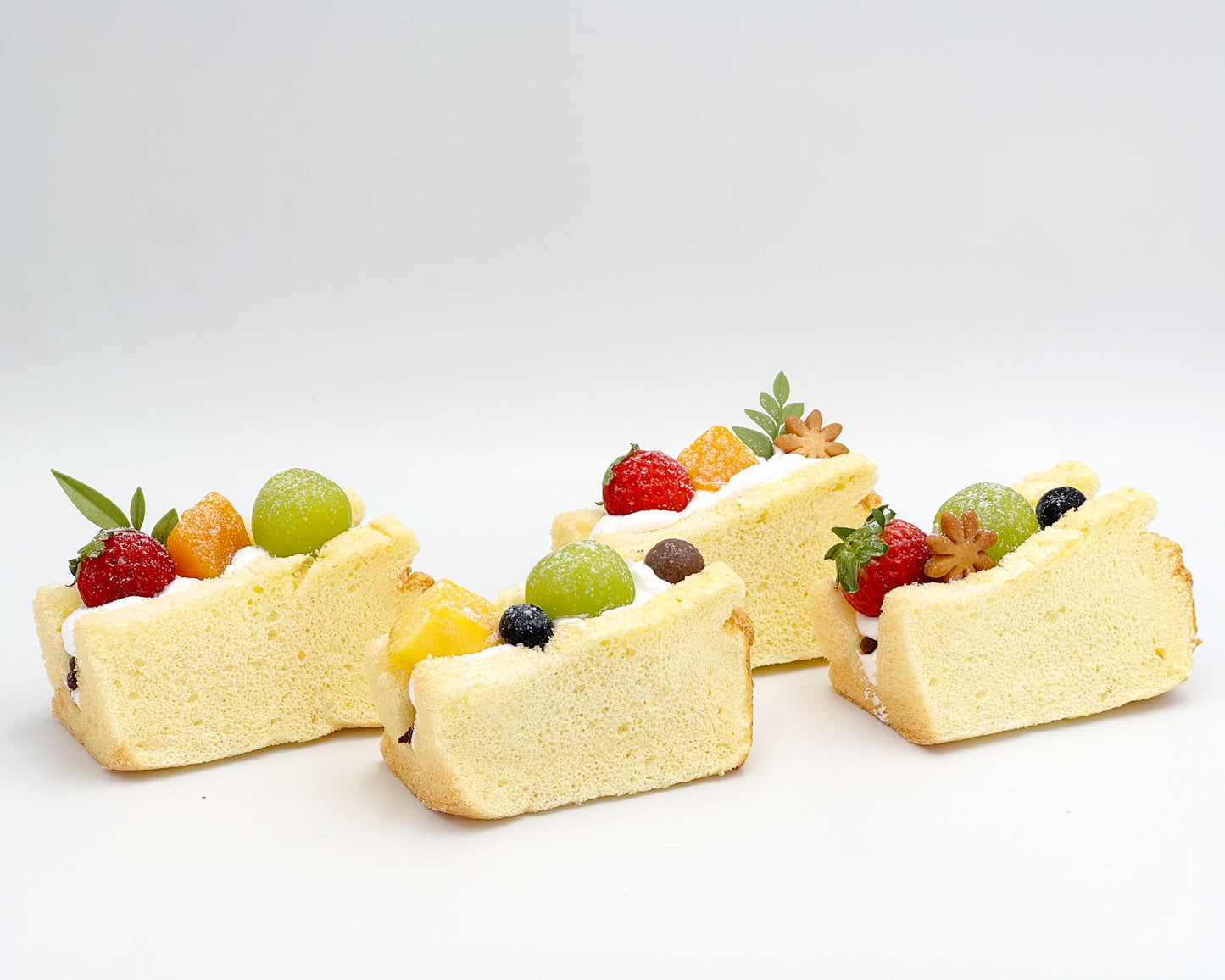 Vanilla chiffon fruit sando on a white background