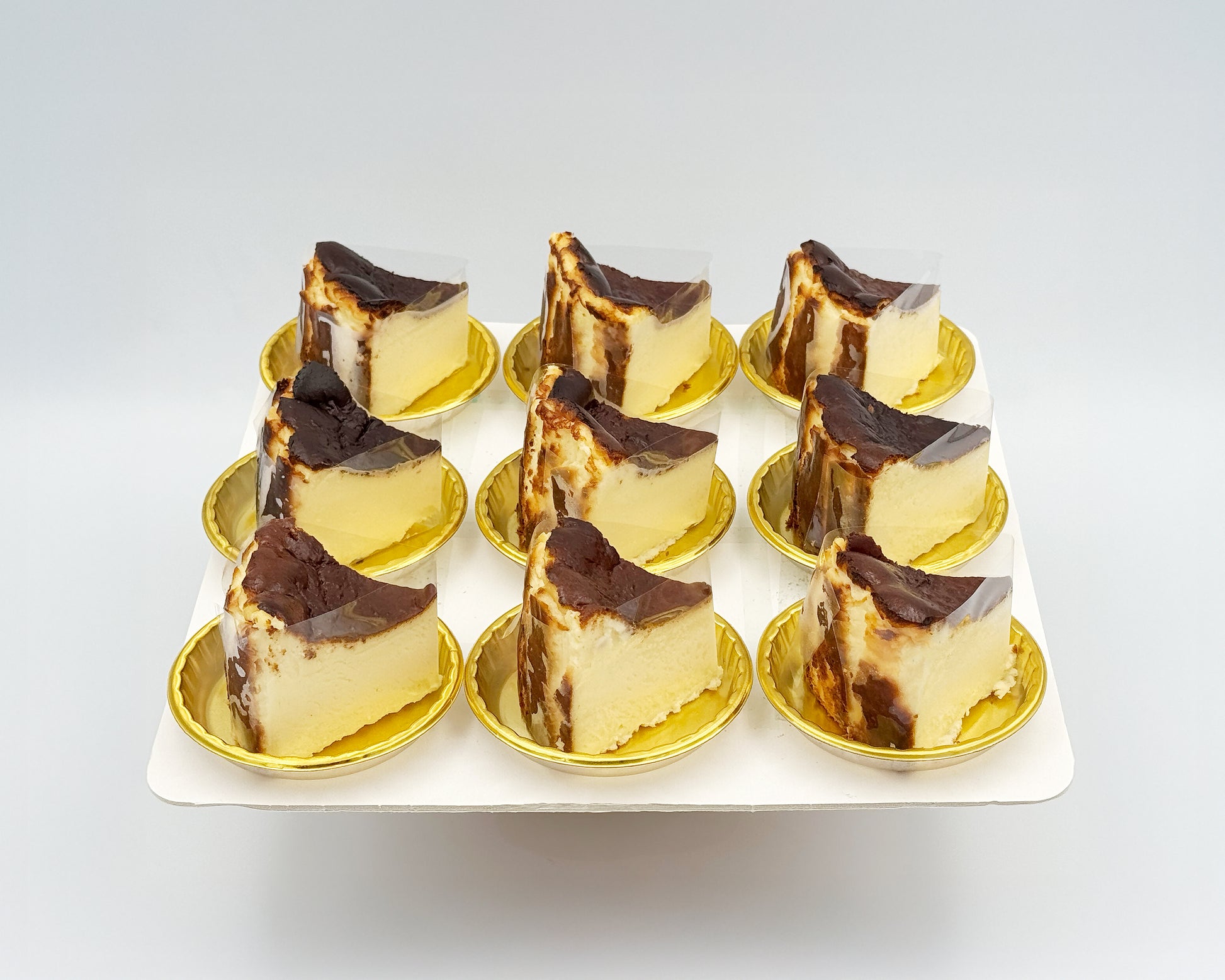 sliced basque burnt cheesecake on a white plate