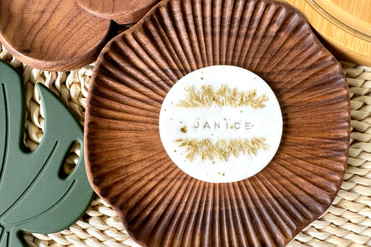 cake topper with name 'JANICE'