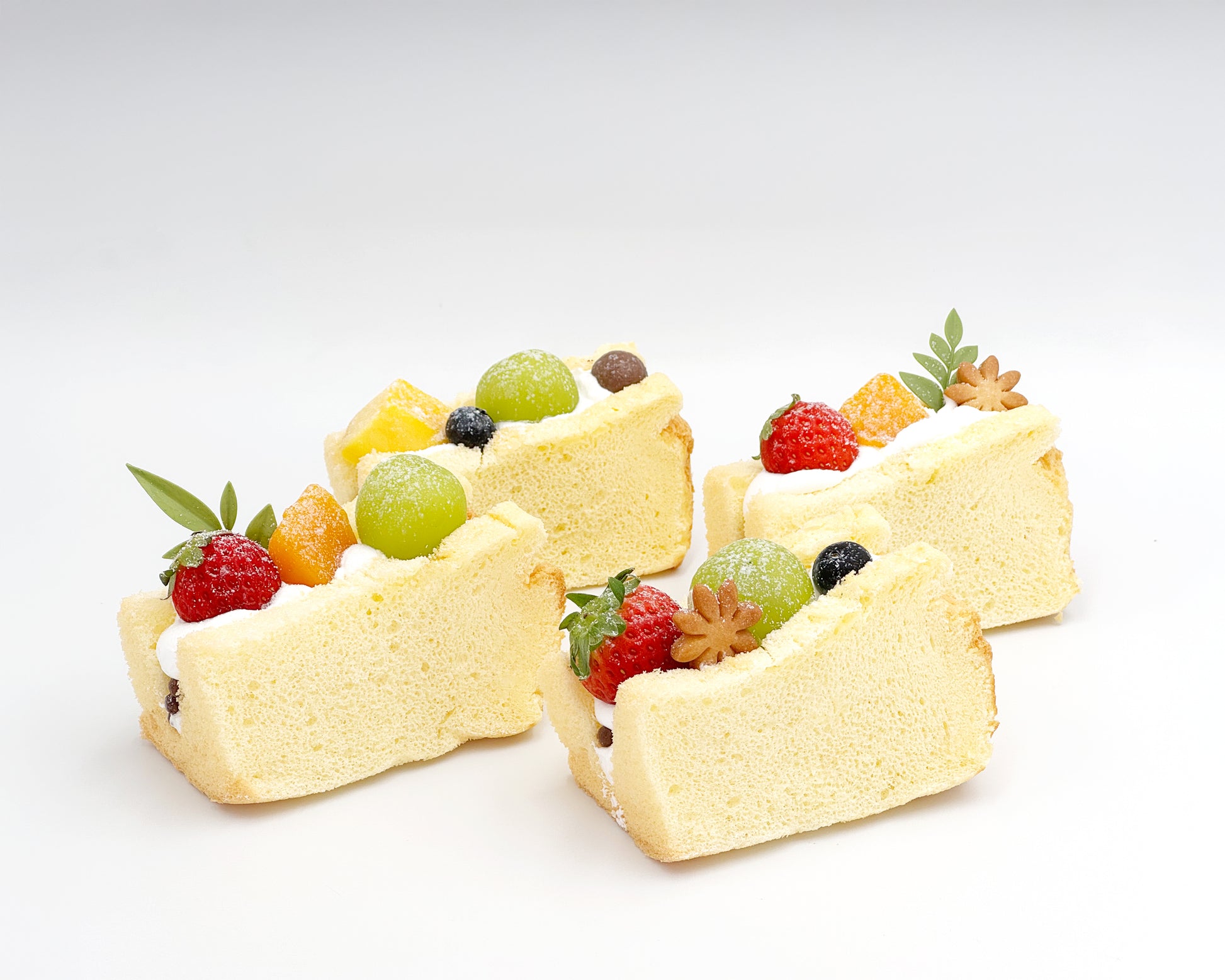 Vanilla chiffon fruit sando on a white background