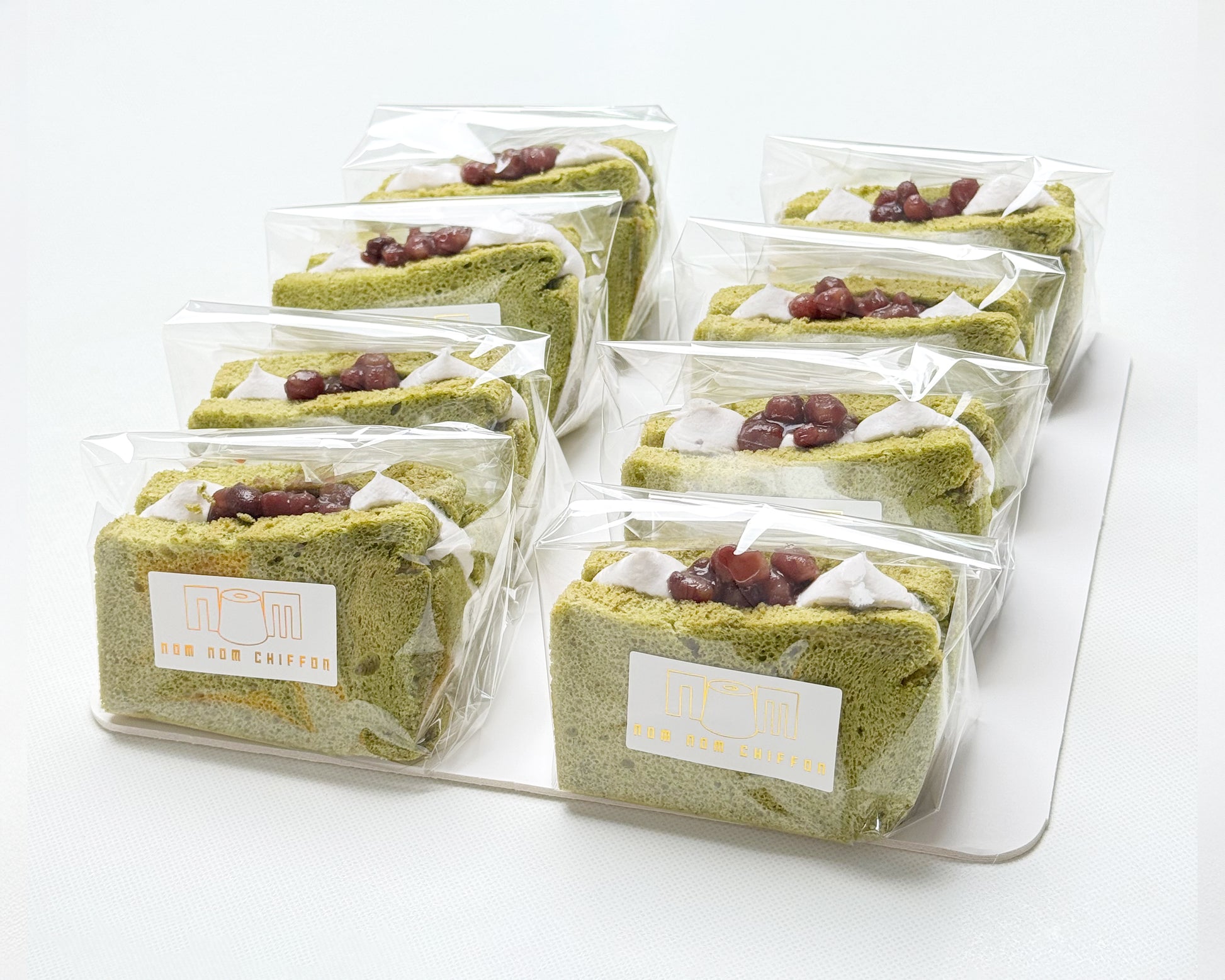 Packaged matcha chiffon sando with fresh cream and Hokkaido Azuki beans and Nom Nom Chiffon logo